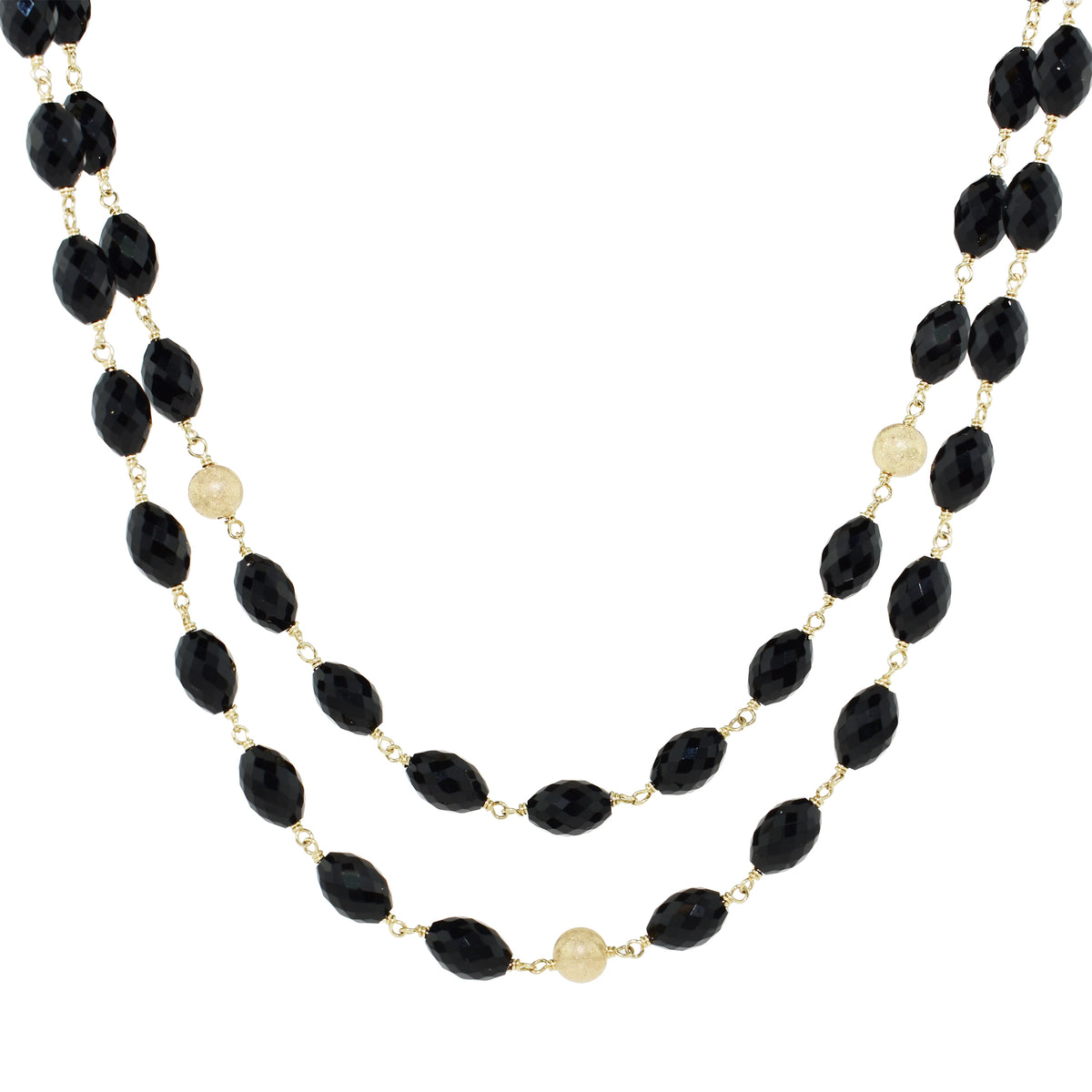 Nehita faceted oval black onyx & gold necklace