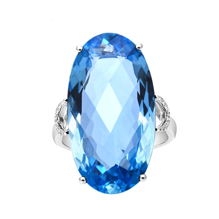 Oval topaz & diamond ring