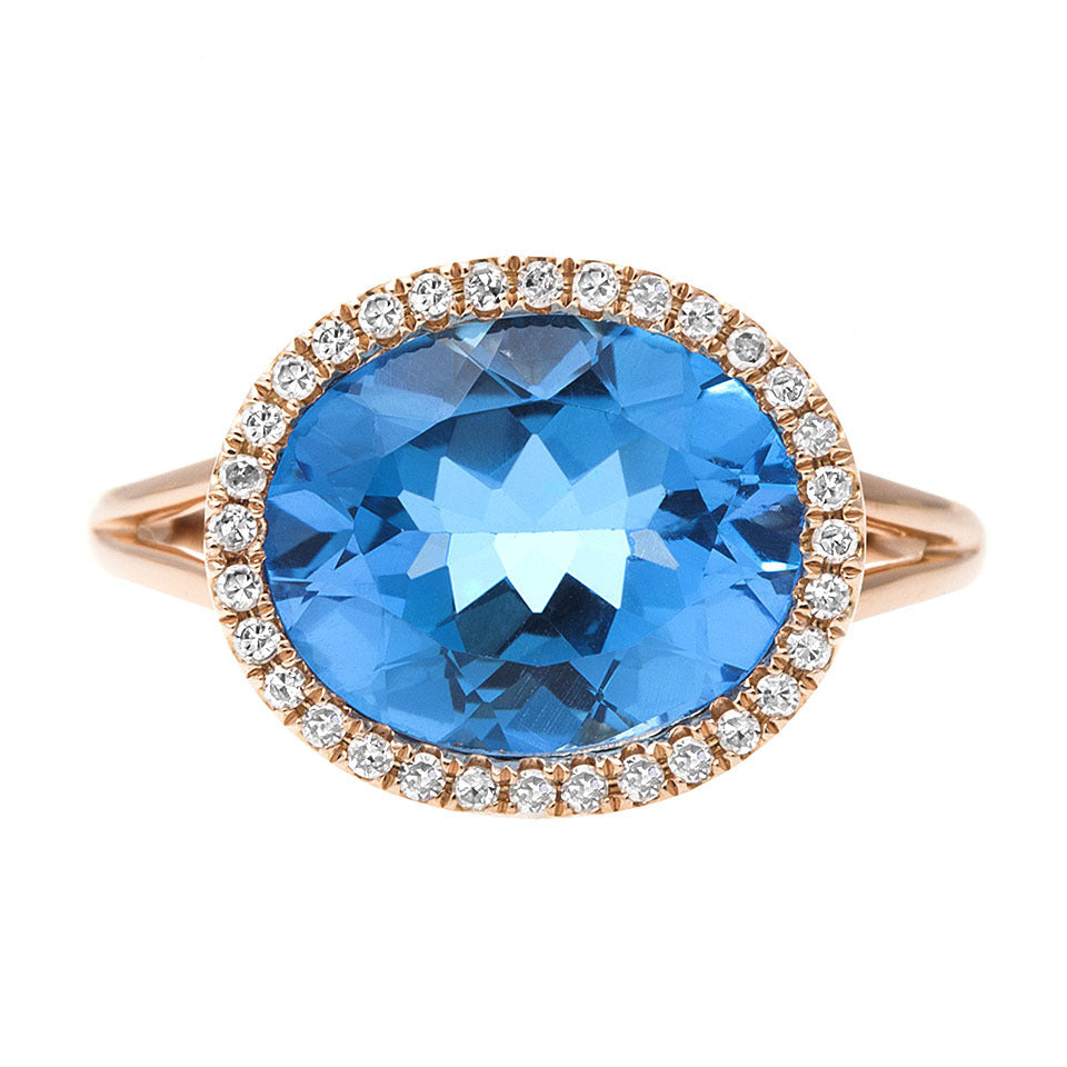 Oval blue topaz & diamond ring